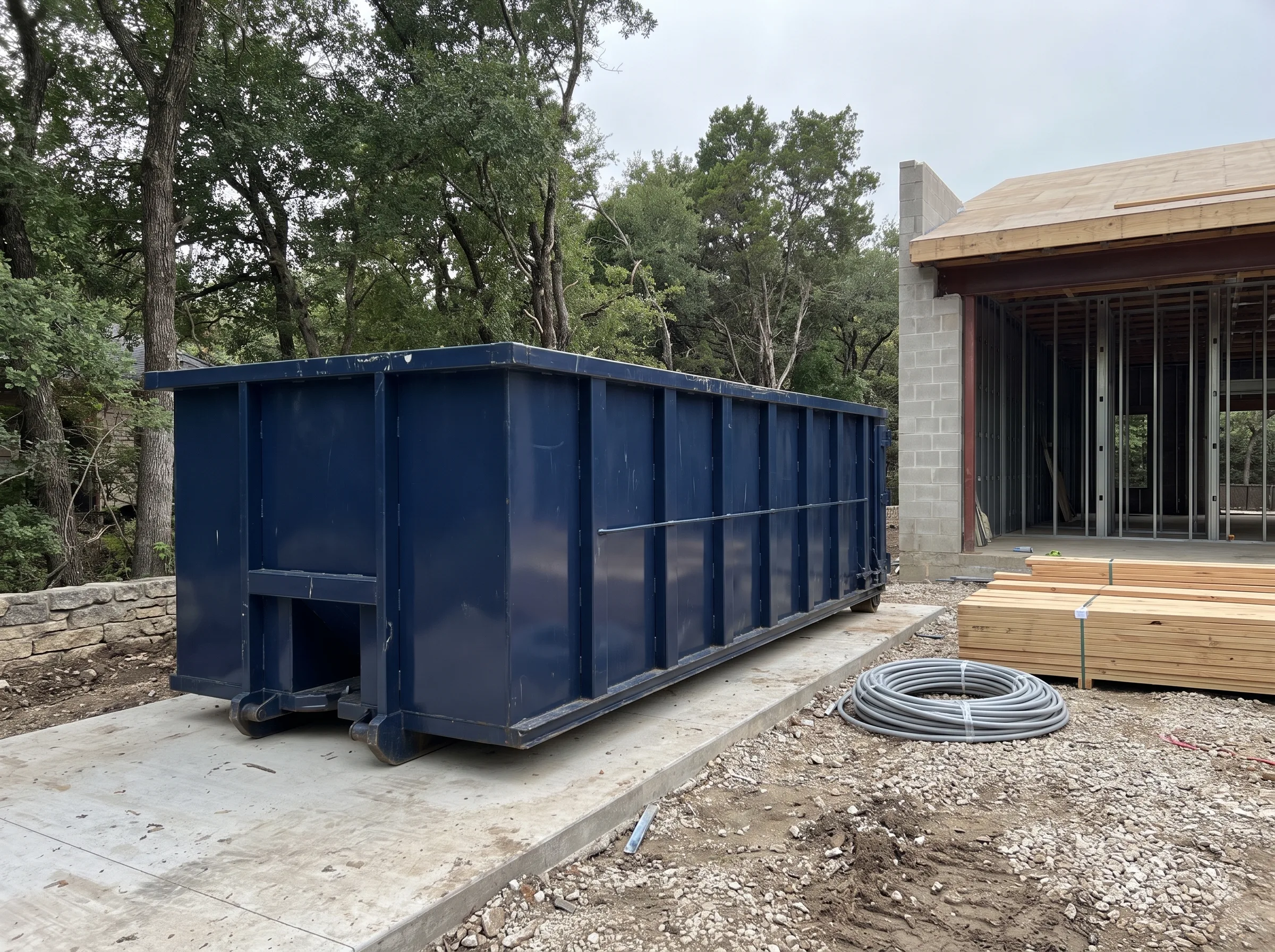 Roll-off dumpster being loaded in Guilderland, NY